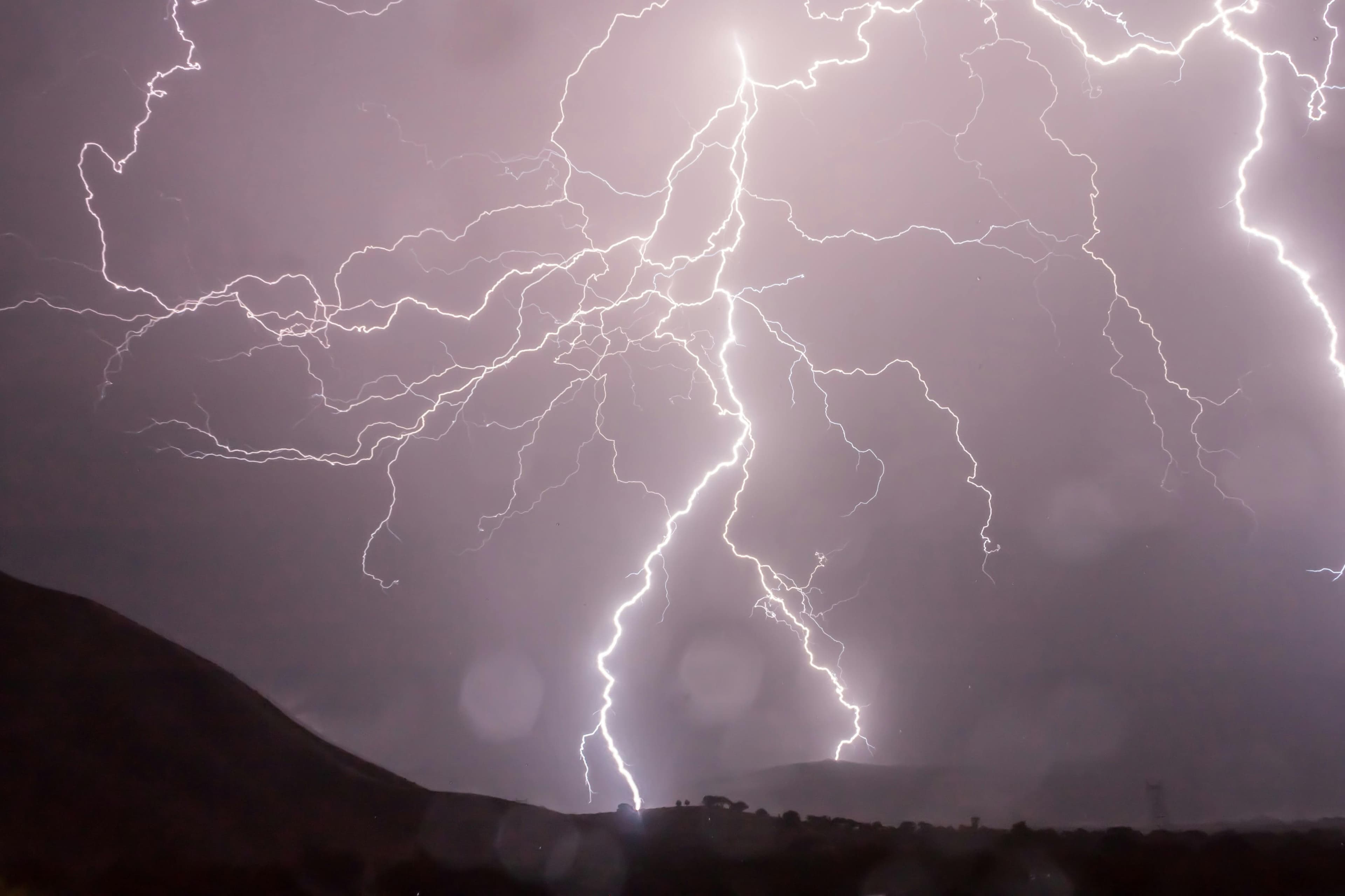 Lightning storm over landscape